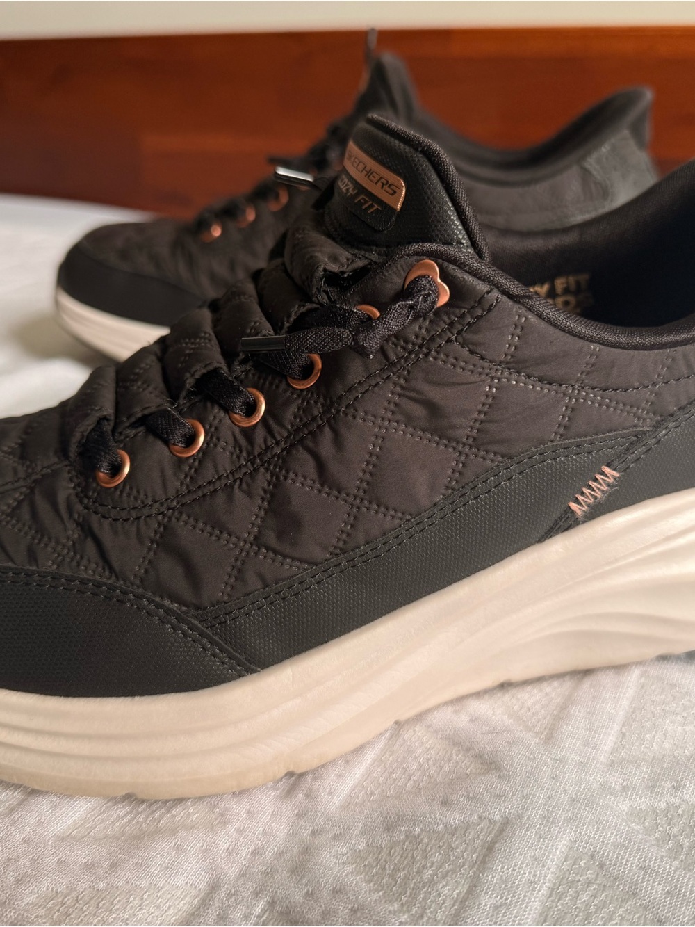 Skechers Women’s Black Quilted Sneaker with Copper Eyelets